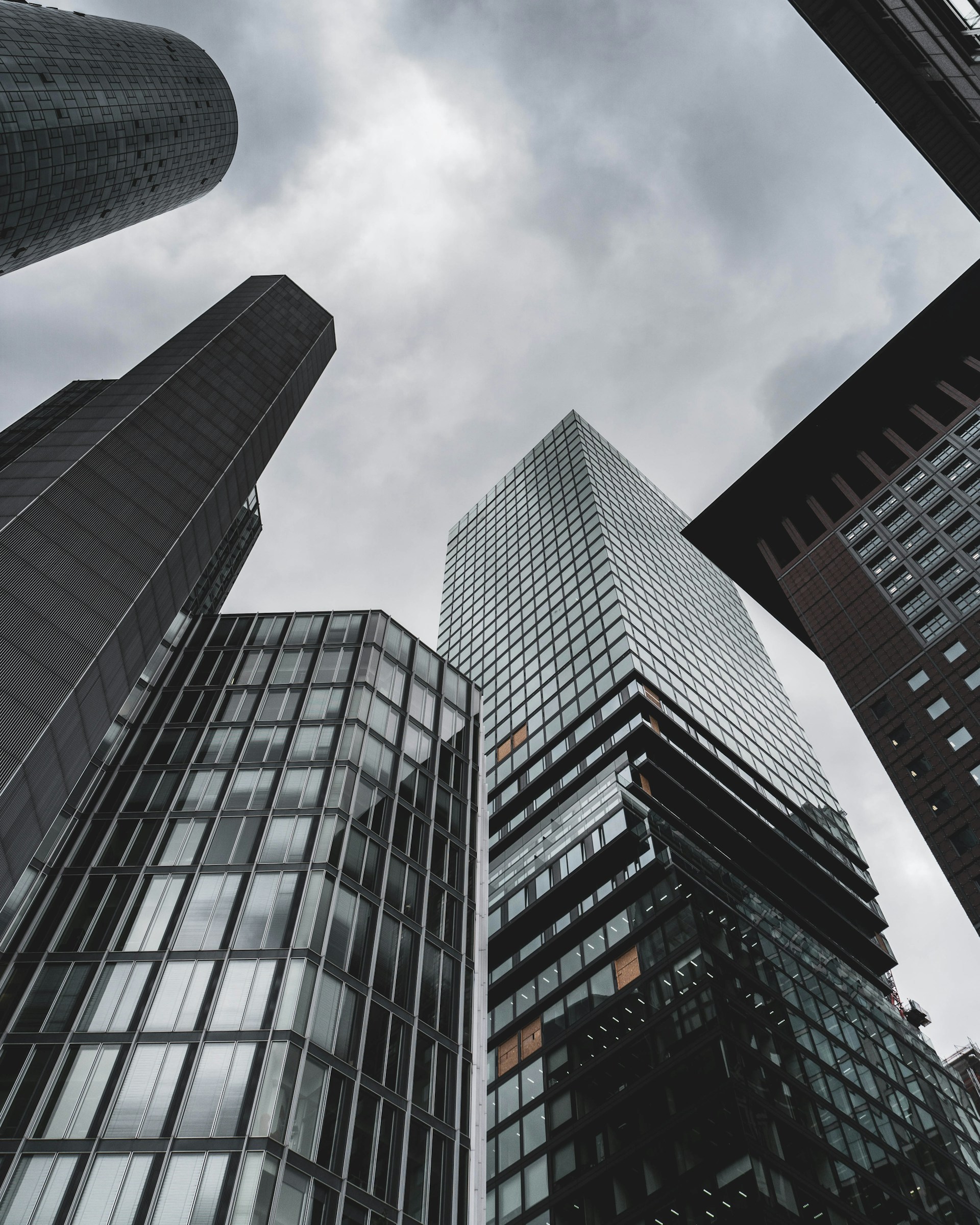 a group of tall buildings standing next to each other